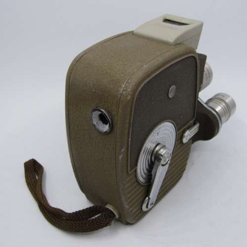 Vintage Keystone 8mm movie camera in damaged pouch - working
