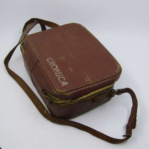 Vintage Keystone 8mm movie camera in damaged pouch - working