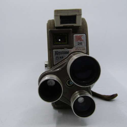 Vintage Keystone 8mm movie camera in damaged pouch - working