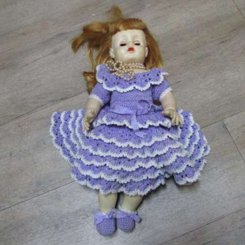 Rubber doll with closing eyes - 56cm