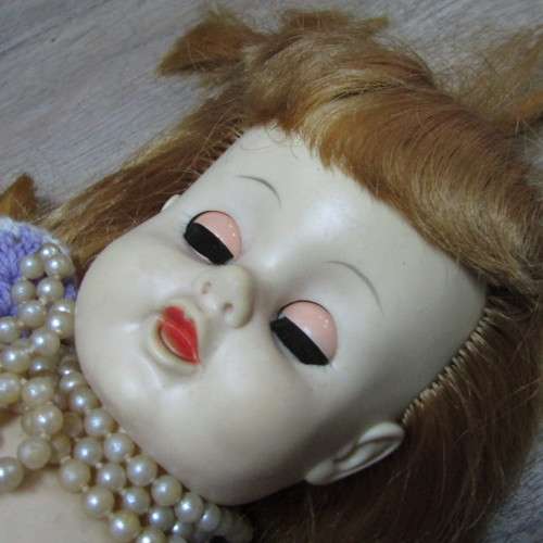 Rubber doll with closing eyes - 56cm