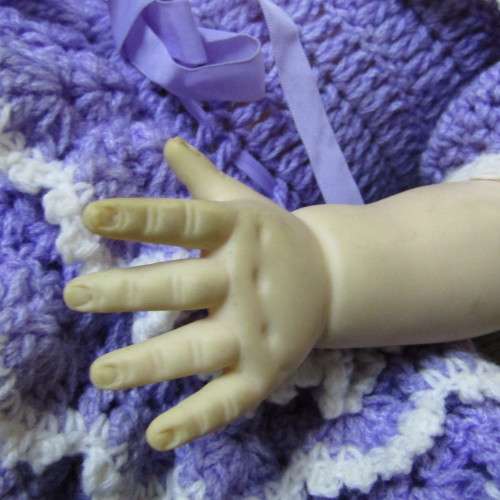 Rubber doll with closing eyes - 56cm