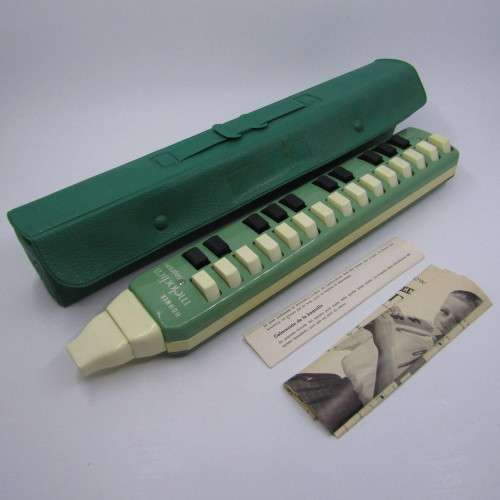 Vintage Hohner melodica in original bag with pamphlets