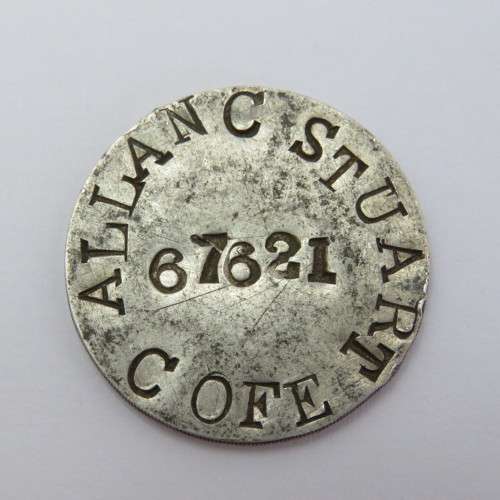WW2 Handmade dogtag on a 1934 Mauritius One Rupee coin