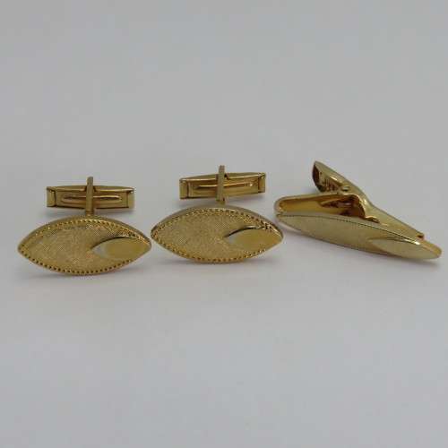 Vintage sets of cufflinks and tie clip