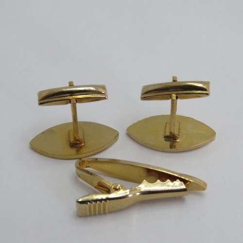 Vintage sets of cufflinks and tie clip