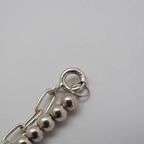 Sterling silver bracelet with dolphin charms - Weighs 10,8 g - Length 24 cm