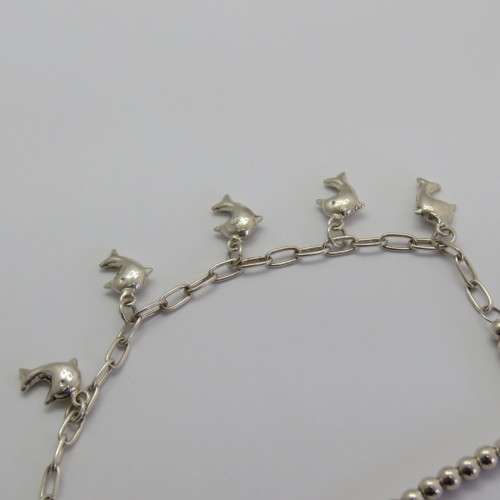 Sterling silver bracelet with dolphin charms - Weighs 10,8 g - Length 24 cm