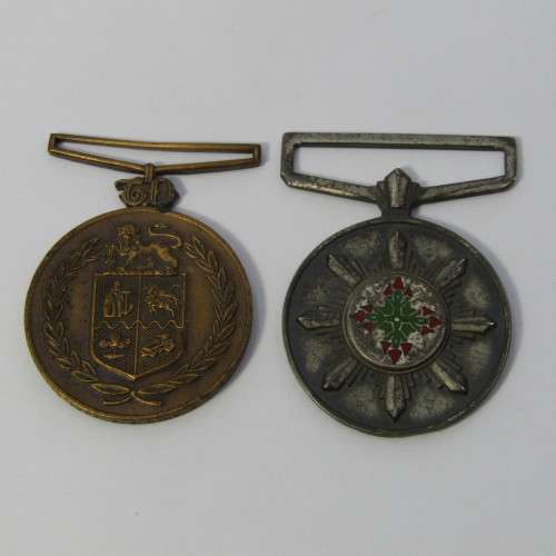 Pair of SA Police faithful service medals - issued to 33191W Sergeant PJ Louw - no ribbons