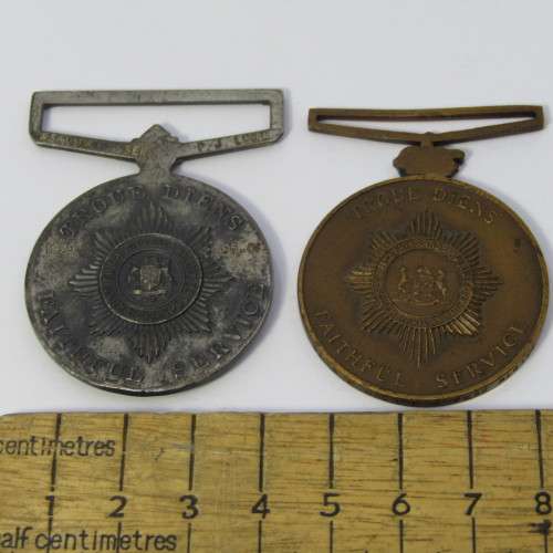 Pair of SA Police faithful service medals - issued to 33191W Sergeant PJ Louw - no ribbons