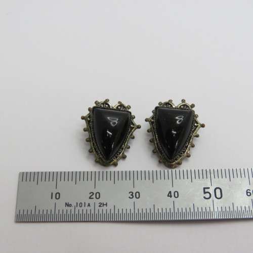 Pair of vintage clip on earrings with black inserts