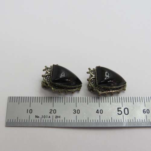 Pair of vintage clip on earrings with black inserts