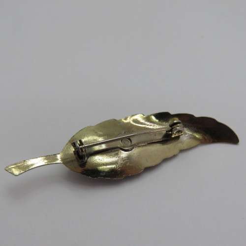 Vintage gold coloured costume jewellery leaf brooch