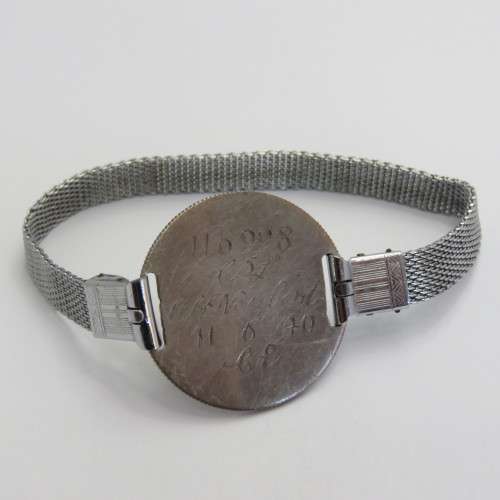 WW2 dogtag bracelet of 116998 Corporal AH Neubert - 11 June 1940 CE