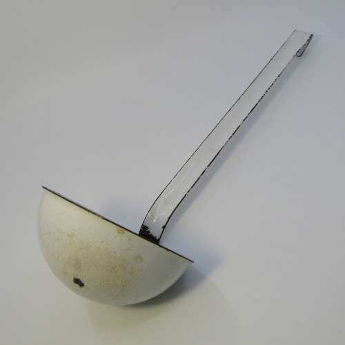Vintage enamel soup ladle