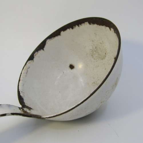 Vintage enamel soup ladle