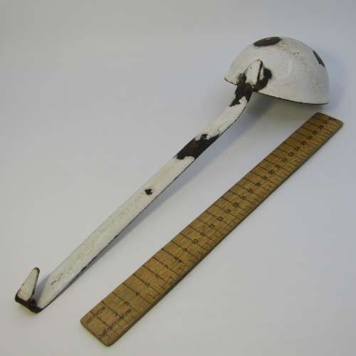 Vintage enamel soup ladle