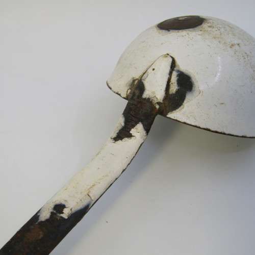 Vintage enamel soup ladle