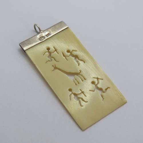 Sterling silver and faux ivory bushman carving motif pendant