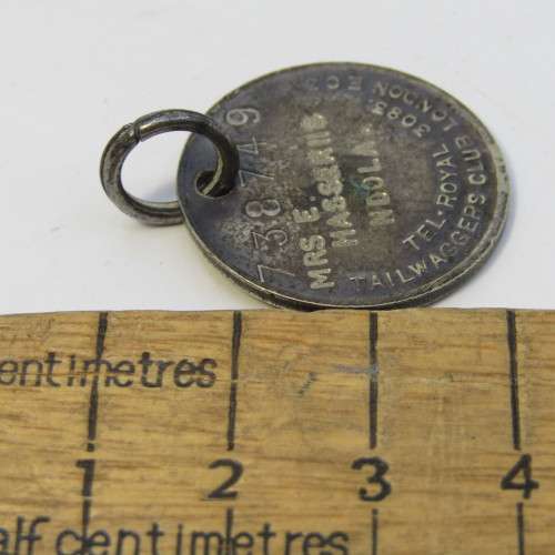 The tail-waggers club dog tag #738749 - Mrs E Hasseriis Ndola
