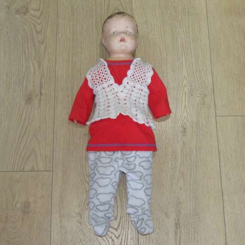 Antique Composition doll with soft body and legs - Some damage to fingers and head - Length 64 cm