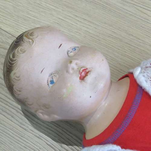 Antique Composition doll with soft body and legs - Some damage to fingers and head - Length 64 cm