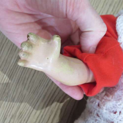 Antique Composition doll with soft body and legs - Some damage to fingers and head - Length 64 cm
