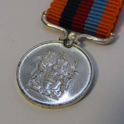 Rhodesia Defence medal for Meritorious miniature medal - Livingstone mint issue
