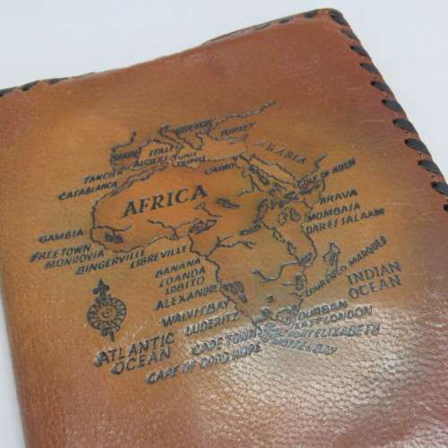 Vintage leather wallet with Africa map motif