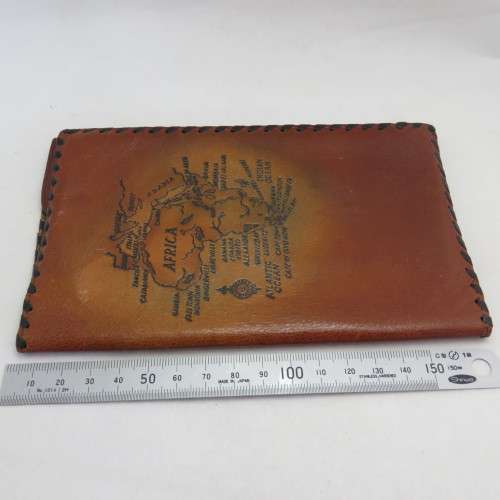 Vintage leather wallet with Africa map motif