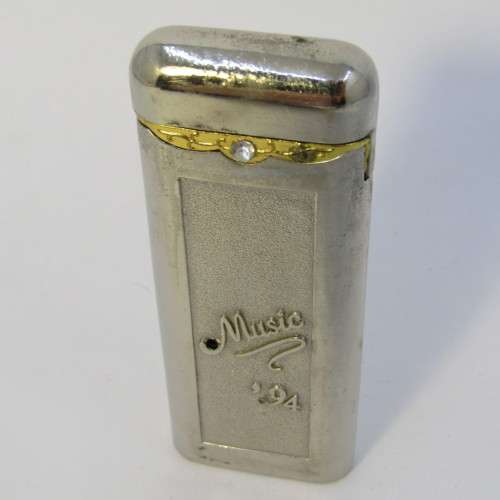 Vintage The Peak of Music electric pocket lighter - not working