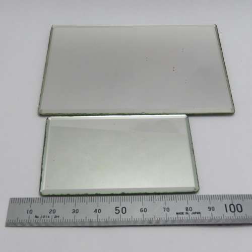 Pair of antique double sided purse mirrors