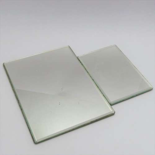 Pair of antique double sided purse mirrors