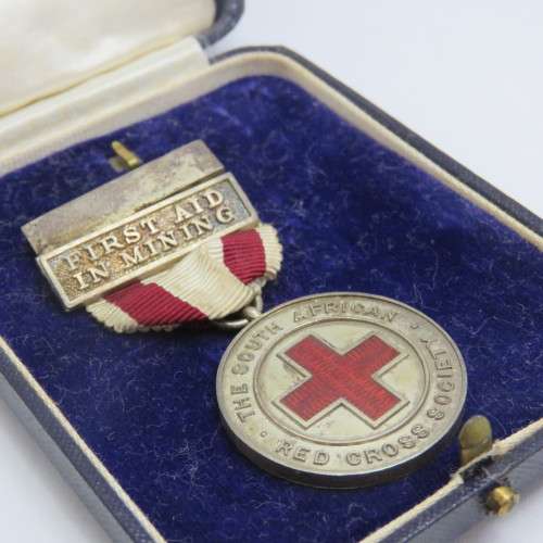 Silver First Aid in Mining Red Cross medal issued to A S Downham - With clasp