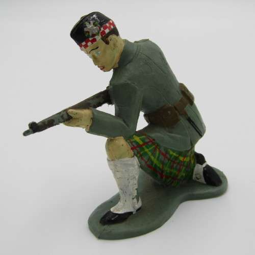 1964 Scottish soldier - kneeling with rifle - made by Louis Marx and Co. Ltd.