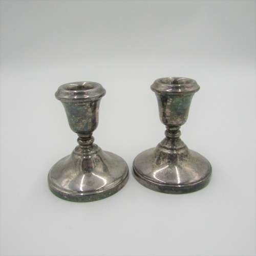 Pair of Lambidis original Silverware candle holders