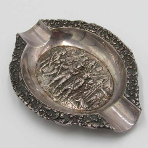 Silver ashtray with Musketeer theme in centre