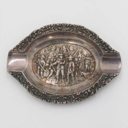 Silver ashtray with Musketeer theme in centre