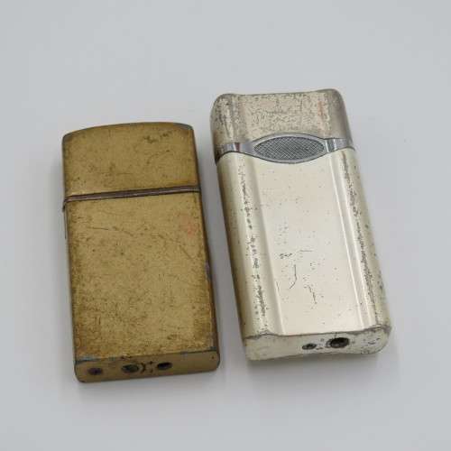 Pair of electric pocket lighters - One working