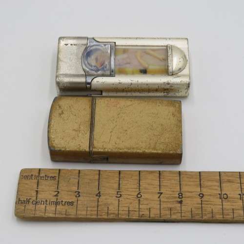 Pair of electric pocket lighters - One working