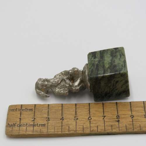 Nickel Dwarf on granite pedestal