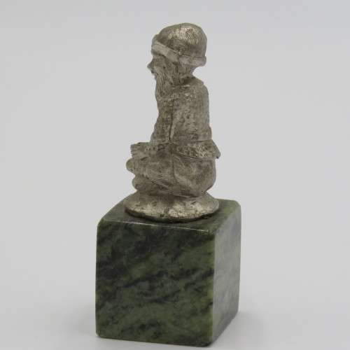 Nickel Dwarf on granite pedestal