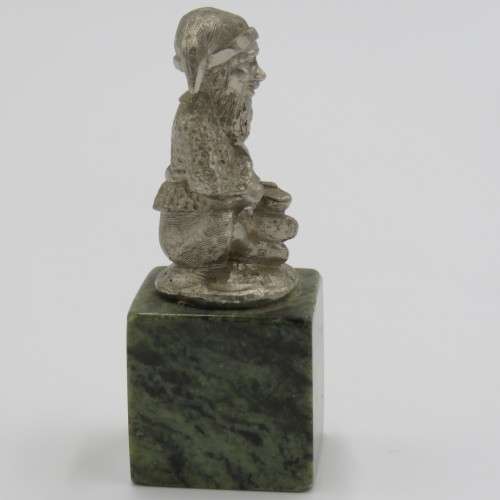 Nickel Dwarf on granite pedestal