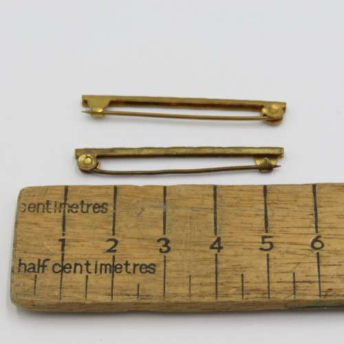 Pair of vintage goldplated tie pins