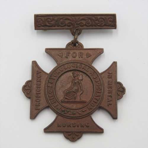 Proficiency in Mental Nursing medal issued to Charles J. Clark