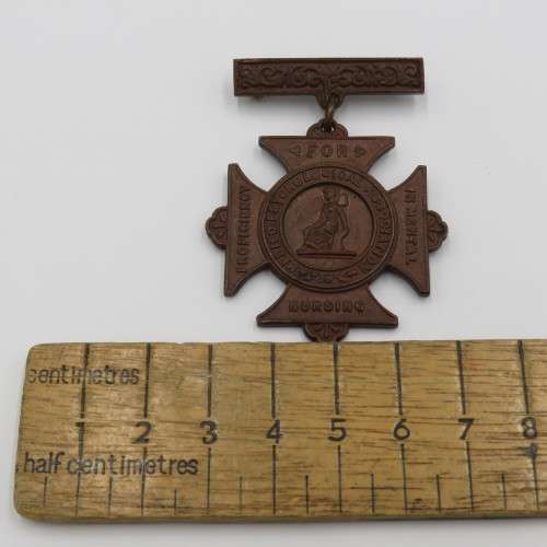 Proficiency in Mental Nursing medal issued to Charles J. Clark