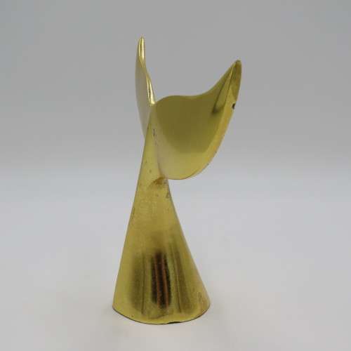 Gold coloured whale tail ornament