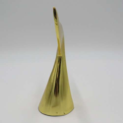 Gold coloured whale tail ornament