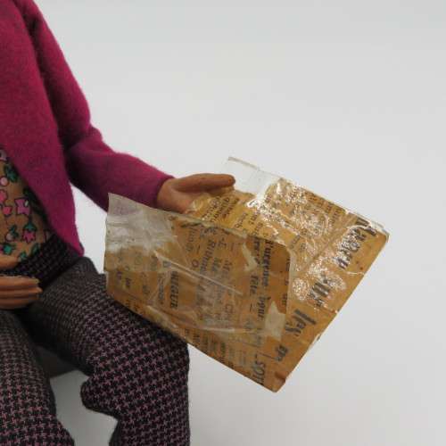 Vintage Composition doll figurine - Sit and reads newspaper - Box not included