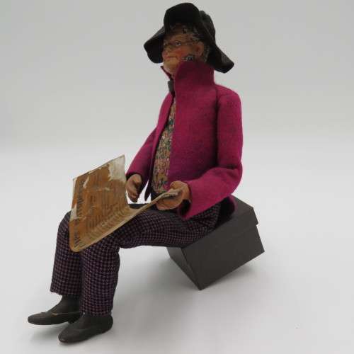 Vintage Composition doll figurine - Sit and reads newspaper - Box not included
